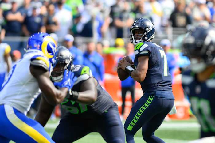 Sep 10, 2023; Seattle, Washington, USA; Seattle Seahawks quarterback Geno Smith (7) looks to pass the ball against the Los Angeles Rams during the first half at Lumen Field.
